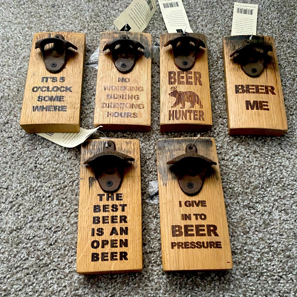 Bottle openers made from vintage wine and whiskey barrels. Each sold separately